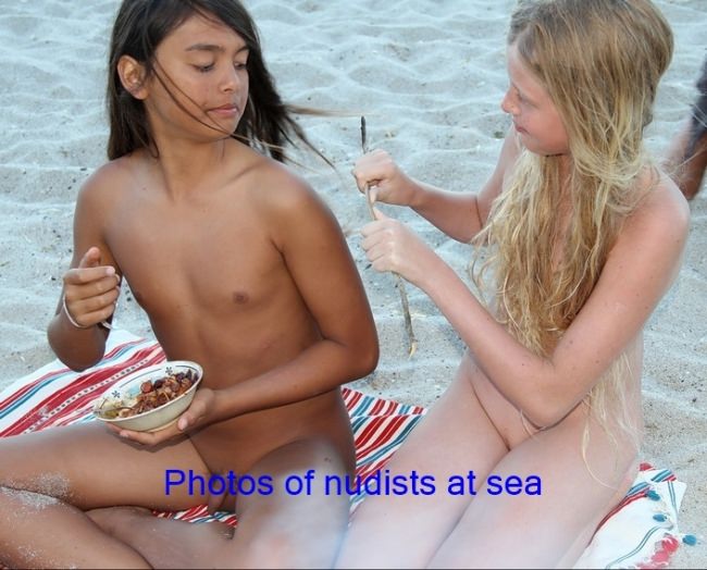 Summer holidays on a nudist beach photo